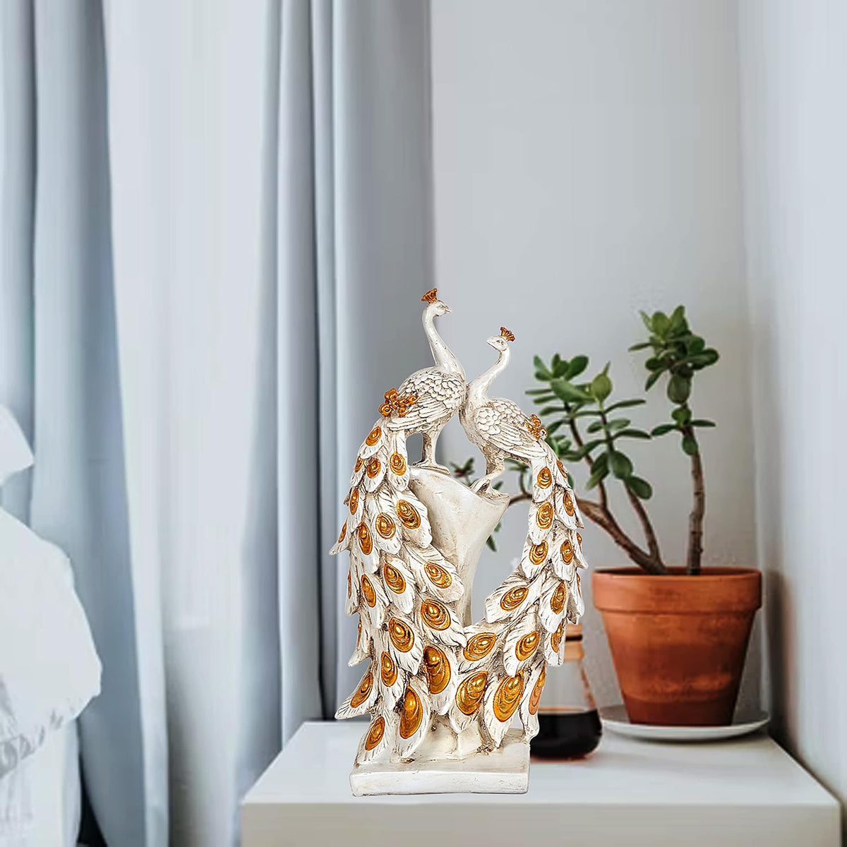 Resin peacock couple showpiece, two standing birds with detailed gold-patterned feathers