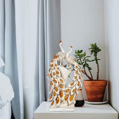Resin peacock couple showpiece, two standing birds with detailed gold-patterned feathers
