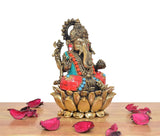 Ganapati Bappa brass idol seated on lotus, raised hand, red-and-blue jeweled details