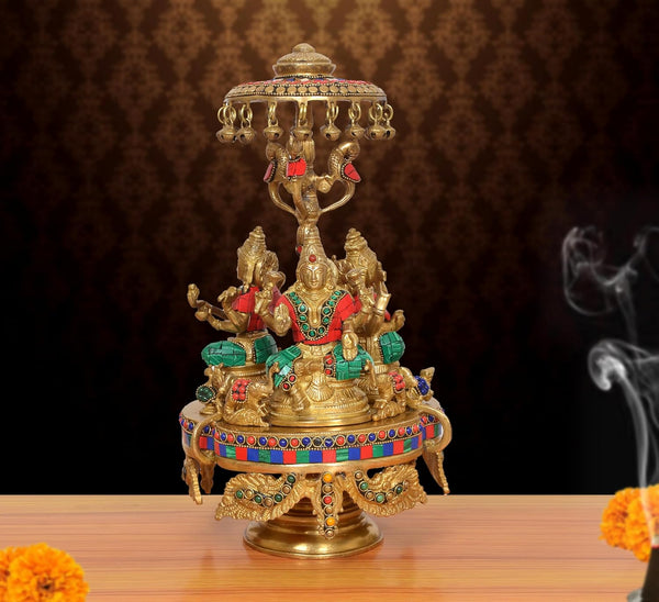 Brass Lakshmi Ganesha Saraswati Idol Seated On Moving Chowki with Parasol Temple Murti (Height: 14 Inch)