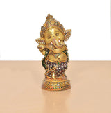 Brass Baby Ganesha sculpture with Meenakari inlays and jeweled crown, side view