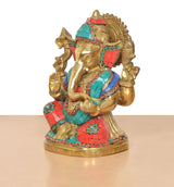 Ganpati Bappa murti angled pose with multicolour mosaic, gold headpiece and base