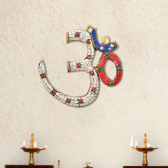 Brass OM wall hanging sculpture with white mosaic tiles and blue, red, green accents