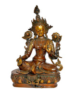 Tara Devi brass statue seated cross-legged, golden face, detailed lotus base and ornaments
