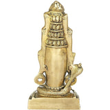 Brass Shiva mukha linga statue, side view with ornate back detailing and animal figure