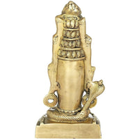 Brass Shiva mukha linga statue, side view with ornate back detailing and animal figure