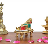 Brass relaxing Ganesha statue, multicolor sash and beadwork details