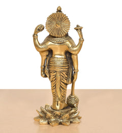 Rear view of golden Brass Lord Vishnu idol with back halo and standing four-armed design