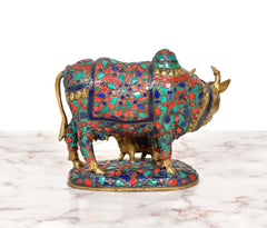Back view Kamdhenu cow statue with calf, multicolor panels and brass details