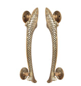Golden brass fish door handles pair, angled view with round mounts and fin details