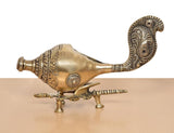 Golden brass shankh conch figure with raised ornamental stand and curled decorative head