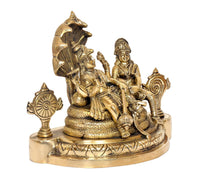 Brass Maa Lakshmi with Lord Vishnu on Sheshnag, side angle, detailed gold finish