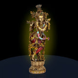 Resin Krishna flute showpiece, gold crown, multicolor attire, standing on round base