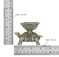 Brass tortoise oil lamp diya statue with size measurements: height 1.25 in, width 3.25 in