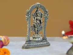Brass Lakshmi figurine on lotus base, seen from a slight angle