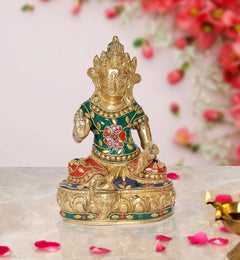 Antique brass Kuvera deity statue, seated, green and red painted details, ornate pedestal