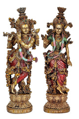 Radha Krishna resin statue set, frontal view of two standing figures with colorful embroidered robes