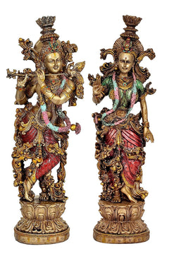 Radha Krishna resin statue set, frontal view of two standing figures with colorful embroidered robes