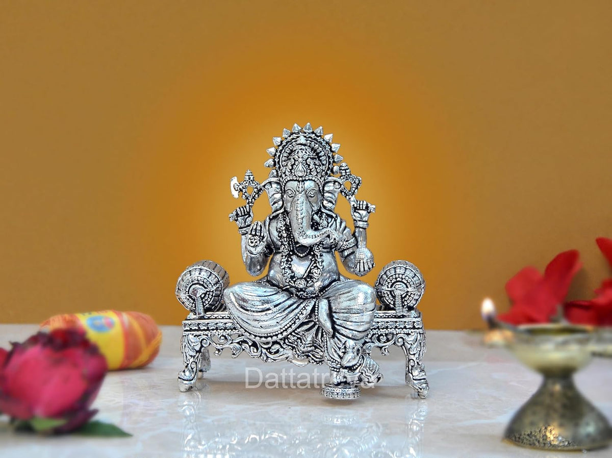 Brass Lord Ganesha sitting Ganpati idol with ornate throne, detailed crown and hands