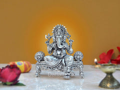 Brass Lord Ganesha sitting Ganpati idol with ornate throne, detailed crown and hands