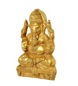 Brass Ganesha wall hanging idol angled view, ornate crown and jewelry details