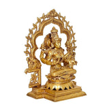 Lakshmi brass statue idol seated on lotus, close view of face, crown, halo