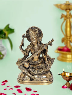 Brass Maa Saraswati idol with veena, seated pose, ornate jewelry details