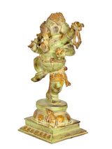 Brass dancing Ganesha idol statue, side view with raised trunk and ornate pendant