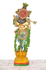 Krishna playing flute statue back view, circular halo and ornate detailing
