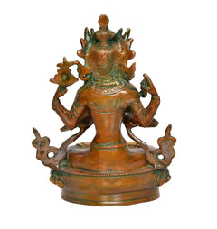 Brass Tara Devi statue, back/side view: crowned figure with halo and lotus base