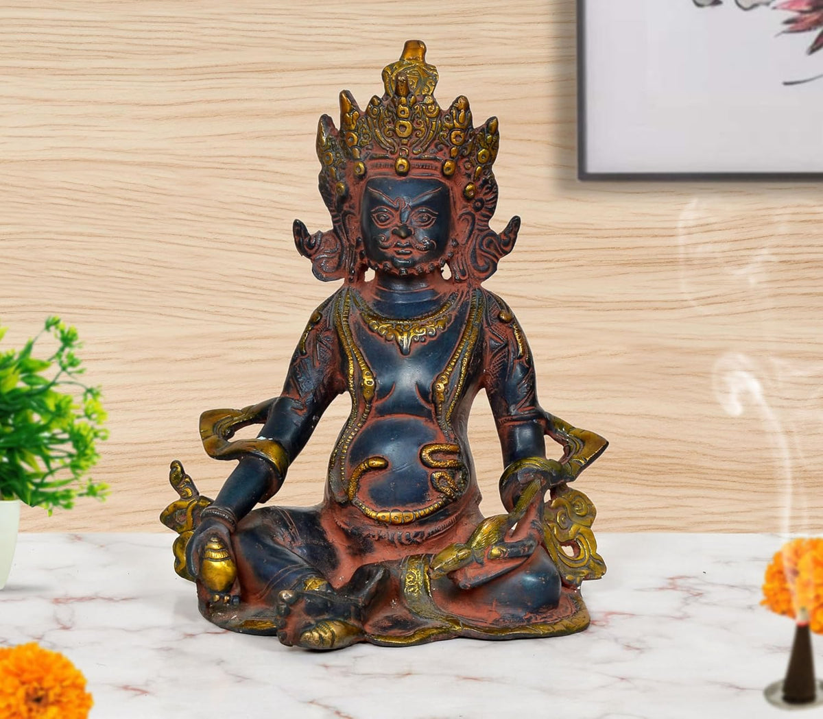 Brass Kuber deity statue in seated pose, ornate crown and gold accents