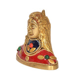 Side view of brass Adiyogi Shiva idol with red cloak, blue chest ornament, golden base