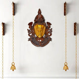 Shiva wall hanging mask idol with golden face, dark ornate frame, hanging chains