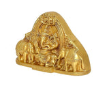 Gold brass Ganesha statue idol side view, ornate arch, seated figure with elephant motifs