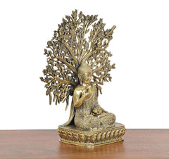 Brass-gold Buddha tree showpiece from side, detailed face and leaf branches