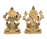 Brass Lakshmi & Ganesh idols, back view, patterned crowns and raised hands