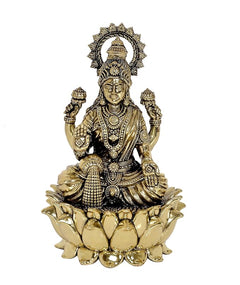 Seated Lakshmi brass statue with lotus pedestal and jewelry detailing, front view