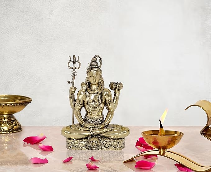 Fine brass Lord Shiva sculpture, seated on stone base, trident raised, 5 in