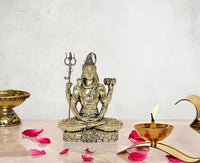 Fine brass Lord Shiva sculpture, seated on stone base, trident raised, 5 in