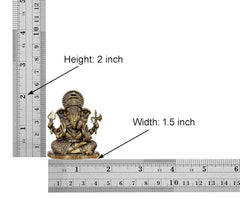 Superfine Brass Ganesha idol on base, height 2 inch, width 1.5 inch (shown with ruler).