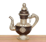 Traditional brass tea kettle decor with dark brown pot, silver spout, and hanging chain