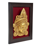 Gold-toned Maa Durga face idol relief with ornate crown, framed wall hanging