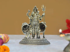 Brass Ardhanarishvara with Nandi and lion, back/side angle, patterned pedestal