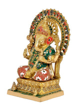 Side view Ganesha idol holding goad, multicolor robe, ornate arched halo