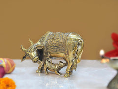 Brass cow and calf pooja mandir decor showpiece, ornate engraved panel