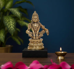 Ayyappan swami seated brass statue on black base, about 4 in tall