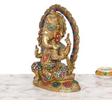 Side view Brass Ganesha statue with multicolor beadwork, raised hands, and halo