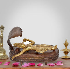 Brass Vishnu yoga nidra statue, reclining figure with cobra hood on circular base