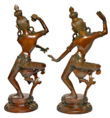 Brass Shiva-Parvati idols from the back view, seated-like dance stance and ornate back details