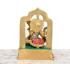 Brass Saraswati idol back view on throne, multicolor belt and inlay